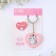 The gift set “Kus is for love”, badge + keychain, 8.3 x 12 cm.