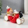 Souvenir Polystone "Clown with a puppy, lies on the drums" White-red 14x5x8.5 cm