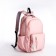 Youth backpack from textiles, 2 departments, 3 pockets, pink color
