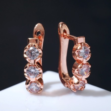 Earrings with rhinestones "Magic" path, trio, white color in pink gold-1