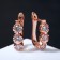 Earrings with rhinestones "Magic" path, trio, white color in pink gold