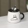 Ceramic mug with a lid and spoon "Panda", 450 ml, white and black color