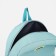 A backpack with a zipper, 3 outer pockets, turquoise color