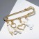 Pin "Medicine" 4 pendants, 6.5 cm, white color in gold