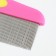 A comb for wool 15.6 x 5.3 cm, long teeth 3.4 cm, pink-yellow