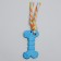 Chewing toy with a rope "bone with a tail", blue