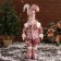 New Year's Jester "in a brilliant suit" moves, 48x16 cm, pink