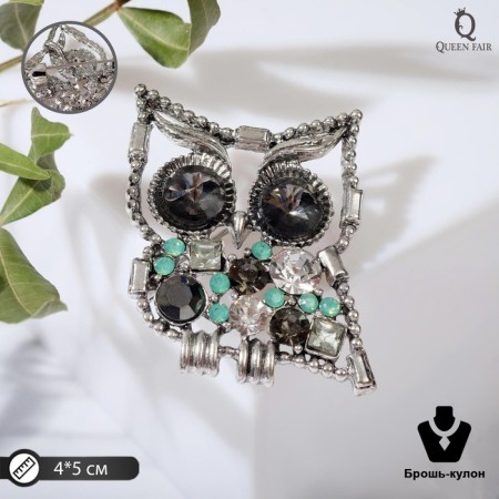 Brooch "Owl", large eyes, the color is gray-green in silver