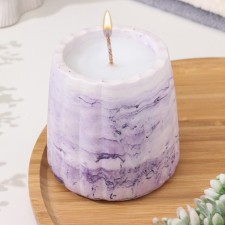 A candle in a candlelight made of gypsum with smooth faces, 9.5x9cm, marble with purple strips