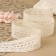 Knitted lace, 55 mm × 10 ± 1 m, beige color