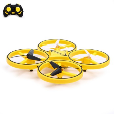 A quadrocopter radio -controlled Drone, backlight, works from the battery, yellow color