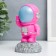 Souvenir Polystone "Astronaut on the Moon" bright pink 11.5x6.5x6.5 cm