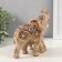 Polystone souvenir "Elephant with an elephant, flowers and patterns on the blanket" Gold and Bezh 15.5x10x16 cm