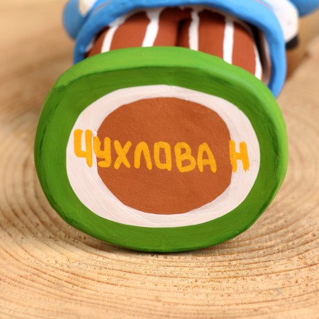 Dymkovo toy "Man with a gift", mix-13
