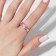 Amore ring row of hearts, the color is pink-lilac in gold, dimensionless
