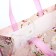 The bag is economic on the button, the color is pink