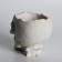 Figure candle in concrete "Crying Skull", black