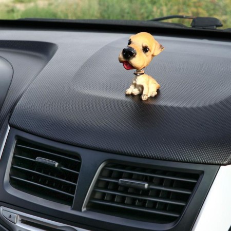 Dog on a car panel shocking his head, Wales Terrier-1