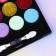 Cosmetics set for girls: shadows, shine, applicator
