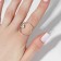 Ring "Trend" circle, white color in gold, dimensionless