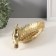 Souvenir Polystone stand "Golden parrot with a crest on a gold sheet" 11x24.5x11 cm