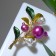 Brooch "Grenade branch", color in gold