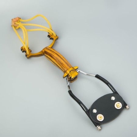 A slingshot with a plastic handle, with an emphasis-2