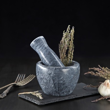 A mortar with a pestle made of stone “marble”, 10 × 8 cm, gray color