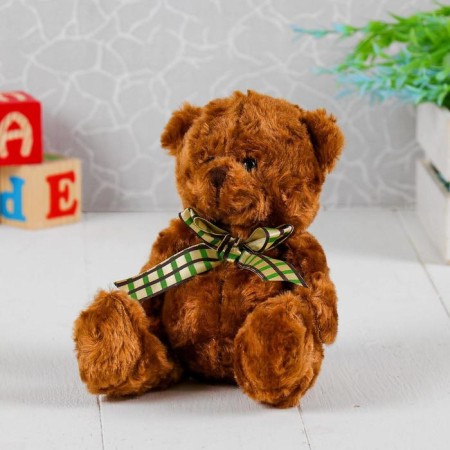 Soft toy "Bear Cinter", bow, cage, color mix