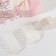 Ribbon is nylon, with rhinestones, 38 mm × 9.1 ± 0.5 m, milk color