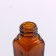 A glass bottle for storage with a pipette, 10 ml, brown/white color