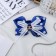 Резинка для волос бант "Школьница" горох, 7 см, бело-синий
