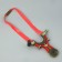 Metal slingshot with a laser target designator, compass