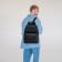 City backpack, textura made of artificial leather with zipper, outer pocket, black color