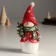 Souvenir Polystone "Snowman in red with a green scarf, holds the Christmas tree" 9.3x8.2x18.7 cm