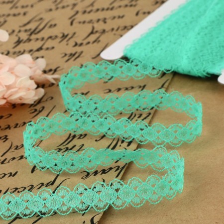 Capricon lace, 15 mm × 10 ± 1 m, green color