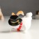 Polystone souvenir "Snowman in the cylinder and scarf, with a squirrel" Mix 12x8x cm