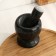 A mortar with a pestle made of stone is medium, 250 ml, black marble, in a box