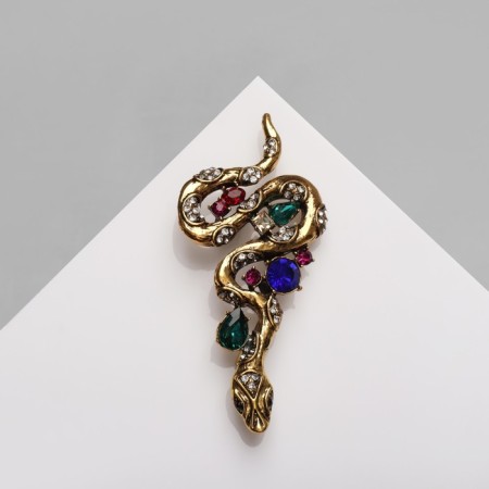 Brooch "Snake" with stones, colored in black gold