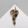 Brooch "Snake" with stones, colored in black gold