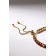 Bracelet with rhinestones "shine" on a puff, colored in gold
