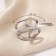 The coupling "openwork" is large, the color is white in silver