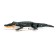 The radio -controlled crocodile, floats, works from the battery, the color is green