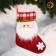Santa Claus with rosy cheeks of 25x36 cm, red.