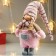 Interior doll "Girl in pink overalls and in pink cap" 49x8x14 cm