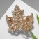 Brooch "Leaf" maple with rhinestones, green color in gold