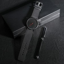 Set: Watch of a wrist and pen 