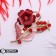 Broch "Flowering", red color in gold
