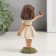 Polystone souvenir "Girl with a chick on the handle" 7.5x4x12.5 cm
