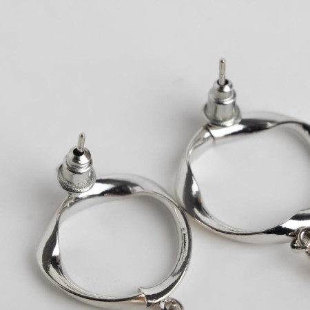 Earrings with rhinestones "sia" drops, white color in silver-2
